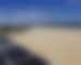 fotowoltaika na babich dołach - zdjęcie ekranów z widokiem na plażę i morze