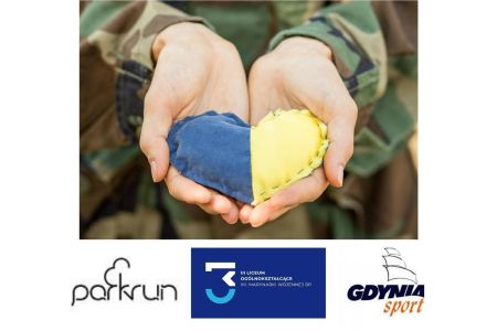 dłonie żołnierza z sercem w kolorach Ukrainy